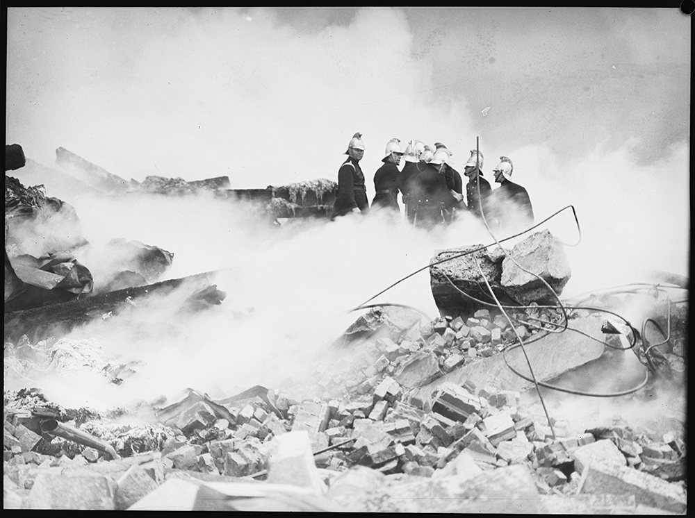 Firemen on the site of Goldsborough Mort's wool store, Pyrmont, Sydney, 1935