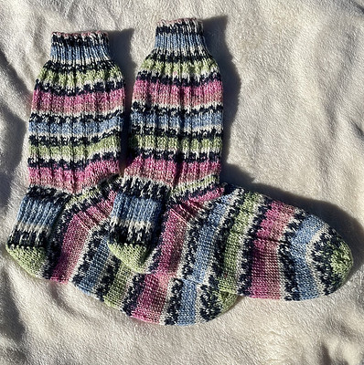 Debbie (@love.knit.spin.weave) finished this pair of Slip Knit Socks by Yarnspirations Design Studio. Yarn is Opal 4-ply.