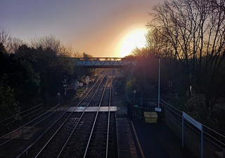 Sunrise on rail tracks