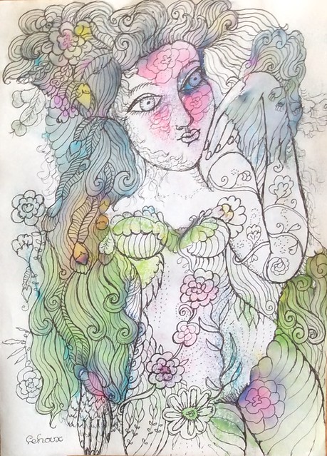 Femme pensive aux fleurs tatouées