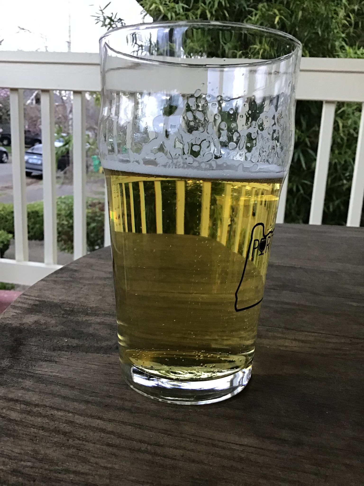 Occidental's Japanese lager in glass on table outside