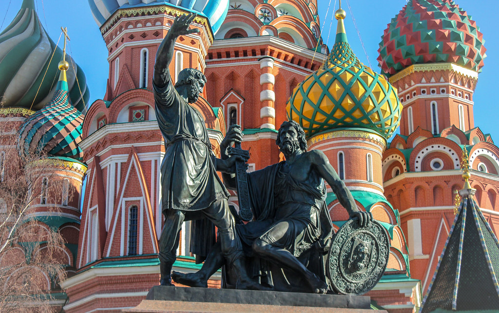 Russia, Moscow, fragment of Monument to the Citizen Kuzma Minin and the Prince Dmitry Pozharsky (since 1818) near the Saint Basil's Cathedral (Protection of Most Holy Theotokos on the Moat since 1561), Red Square, Tverskoy disrict.