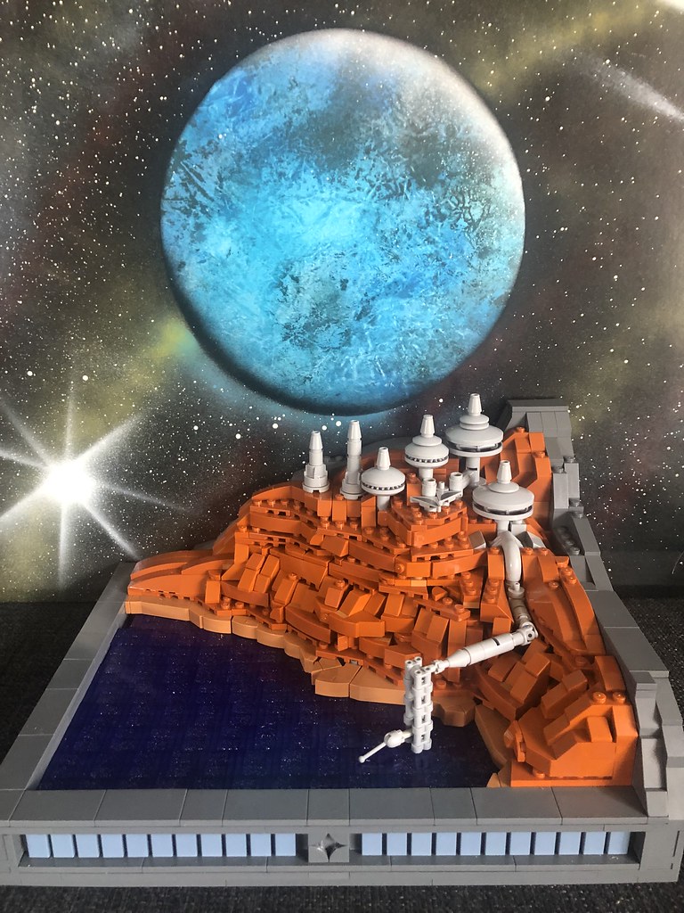 The Purple Waves. A micro scale space mining facility moc I build a month a go. I am really happy with the moc, especially the water. The water is 1x1 bricks in dark purple with glitter on the side.