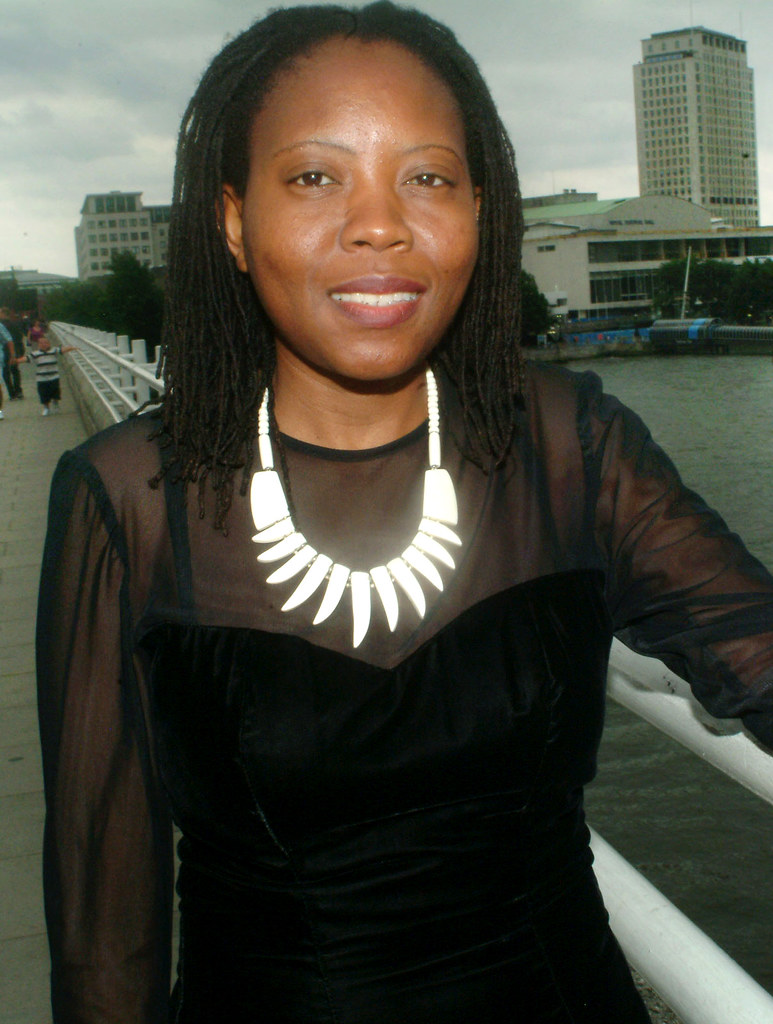 DSCF6015v Gabisile aka Gaby South African Model in Black Velvet Evening Dress with White Bovine Bone Necklace On Location Portrait Photoshoot Waterloo Bridge London The River Thames Looking South West towards The Southbank Royal Festival Hall