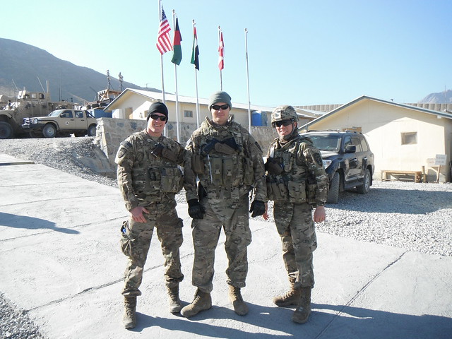 Dan Morris stands with two other soldiers in Afghanistan.