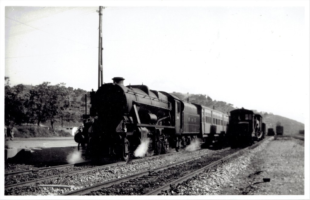 Palestine Railways (War Department) - WD Class 8F 2-8-0 steam locomotive and passenger train at Tul Karm (طولكرم) station in 1946