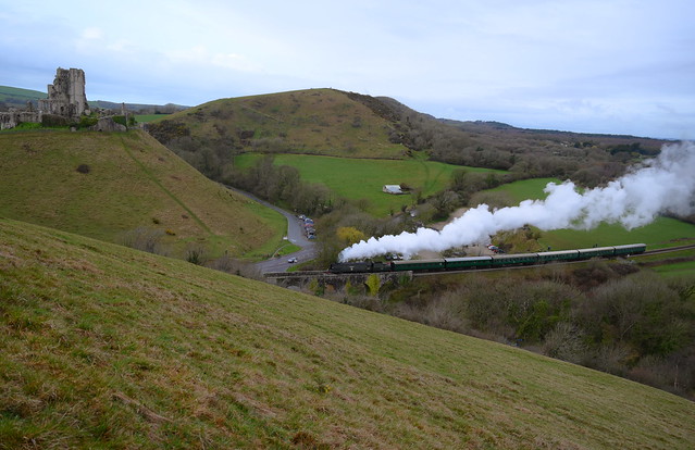 Bulleid Pacific No.34070 'Manston' heads the first train of the day back to Swanage from Norden, passing the ruins of Corfe Castle. Swanage Railway Spring Steam Gala. 26 03 2023