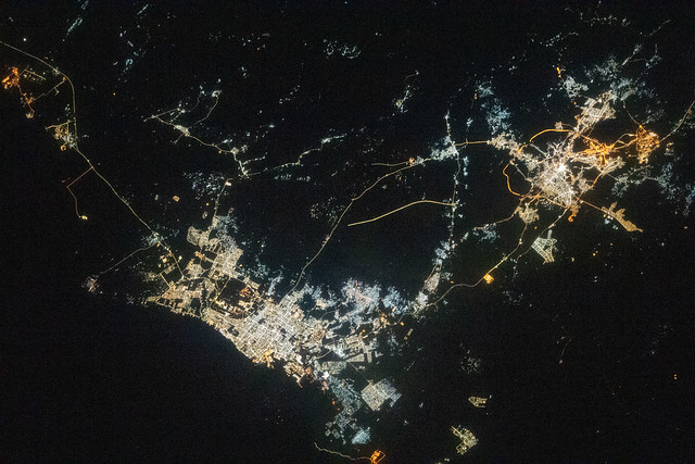 The night lights of the Saudi Arabian cities of Jeddah and Mecca