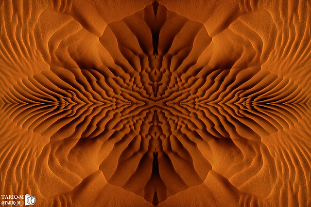 Symmetry of sand