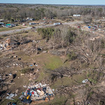 Aerial view of damage to homes, property, and the high school in Wynne, Arkansas following a devastating tornado on March 31, 2023 