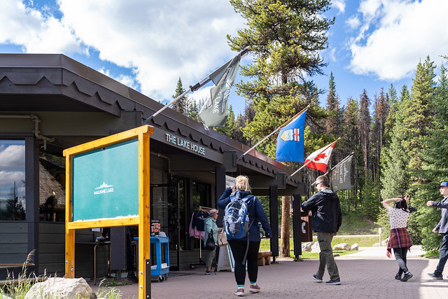 Jasper, Alberta, Canada - July 13, 2022: Tourists file into the Maligne Lake gift shop after going on a boat cruise