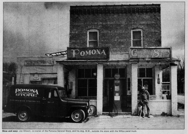 Photo of man, dog, and truck in front of Pomona General Store