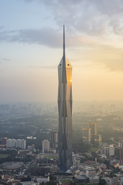 Sunset view of Merdeka tower with golden hour light