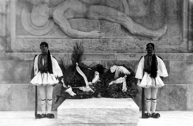 Evzones at the Tomb of the Unknown Soldier in Athens stand guard over wreaths honoring fallen German soldiers during the Occupation of Greece circa 1943/1944