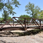 Unknown Bridge – Pecan Creek Park (Hamilton, Texas) Old Warren pony truss bridge in Pecan Creek Park in Hamilton, Texas.  