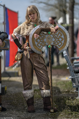 Beardless Dwarven women are fierce warriors and skillful axe-wielders