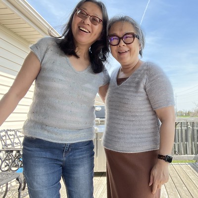 My sister and I are both wearing one of our Rock It Tees by Tanis Lavallee! We liked the pattern so much that we have both knit three of them.