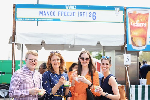 Enjoying Mango Freeze at French Quarter Fest - April 14, 2023. Photo by Michele Goldfarb.