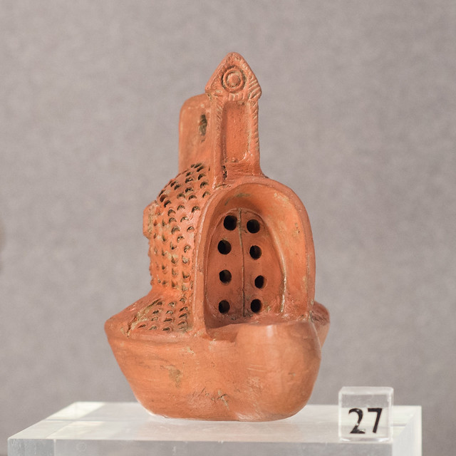 Roman ceramic lamp in the form of a gladiator's helmet