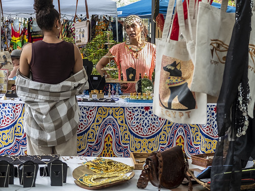 Vendor at Congo Square Rhythms/Treme Creole Gumbo Festival - March 2023. Photo by Marc PoKempner.