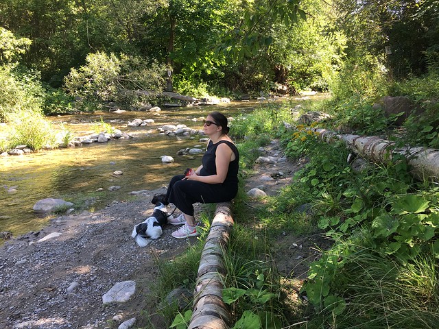 My dochter and her dog Georgie on a log at Bowmanville creek alongside Bowmanville Valley trail in Bowmanville Valley concervation area , Martin’s photographs , Bowmanville , Ontario , Canada , September 4. 2021