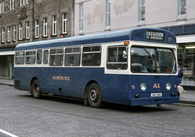 Ayrshire Bus Owners ( A1 Service ) Ltd . T & E Docherty . Irvine , Ayrshire . Scotland . AML88H . Irvine Town Centre , Ayrshire , Scotland . Monday 20th-March-1978.