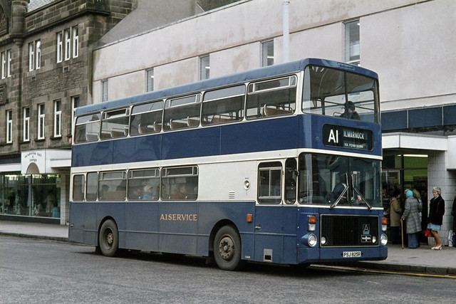 Ayrshire Bus Owners ( A1 Service ) Ltd . T. Hunter . Kilmarnock . Ayrshire , Scotland . PSJ825R . Irvine Town Centre , Ayrshire , Scotland . Monday afternoon 20th-March-1978 .
