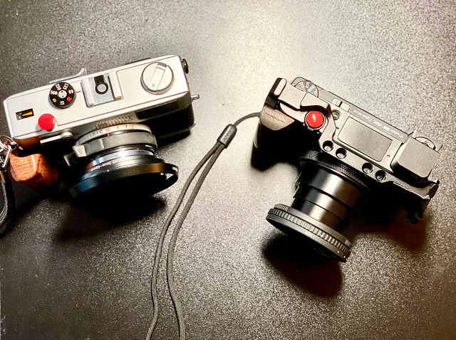 Same size, separated by 50 years, the compact film camera  Olympus 35RC and the new Sony digital RX100mod7