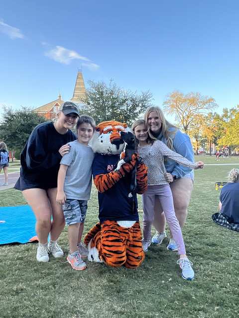 Students with project uplift participants and Aubie