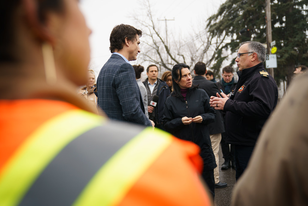 Prime Minister Justin Trudeau meets with workers cleaning up damage ...