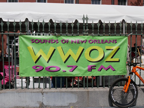 WWOZ banner on the fence at French Quarter Fest 2023. Photo by Louis Crispino.