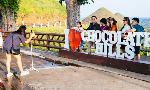 people taking photos, Chocolate Hills, Bohol by _gem_, I spent a weekend in Panglao Island, Bohol, for my first commercial air travel experience since the 