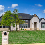 Indian Ridge | 13151 Broken Arrow Arciadia OK Welcome to this magnificent, magazine-worthy home! Boasting exceptional curb appeal with a side entry garage, this stunning residence showcases an open floor plan with a grand entryway; light engineered wood floors, a 15 ft ceiling with wood beam, and large windows along the back for an abundance of natural light.
The chef&#039;s dream kitchen features custom cabinetry, gorgeous quartz countertops, and an expansive eat-in island with additional shelving. Retreat to an enormous master bedroom with a spa-inspired ensuite bathroom, a luxurious shower, and an oversize closet connecting to the laundry room.
The versatile office can easily serve as a 4th bedroom or secondary living space. Escape to your private outdoor haven on the beautiful back patio, perfect for relaxation or entertainment. Enjoy the convenience of an all-electric, split floor plan with a master bedroom separate from the others.
Experience excellence in every detail of this exquisite home. Take the chance to make it yours!