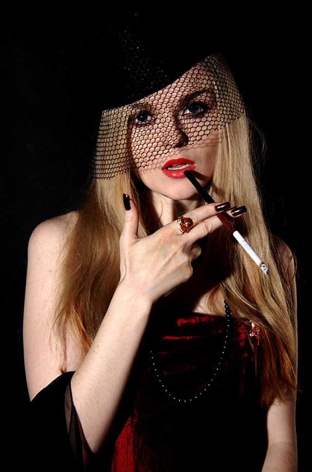 Glamour of cigarette holder smoking | Frances Netherland | Flickr