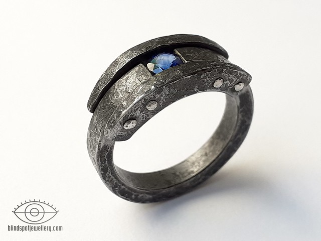 Ring - iron, sapphire, silver (rivets)