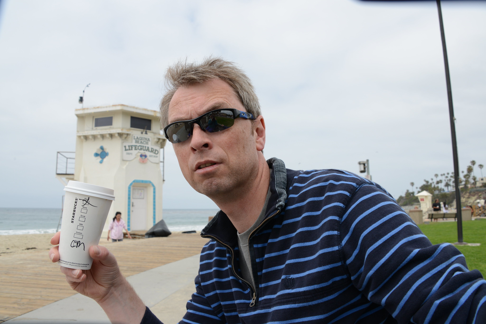 Nige enjoying a Starbucks at Laguna Beach