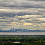 New York City #2 28x Zoom I was making some drone pictures above an area of Holmdel, New Jersey, when I rotated the drone to face the north east and saw New York City on the horizon, 28 miles away across the Raritan Bay and past the Varrazzano-Narrows Bridge.