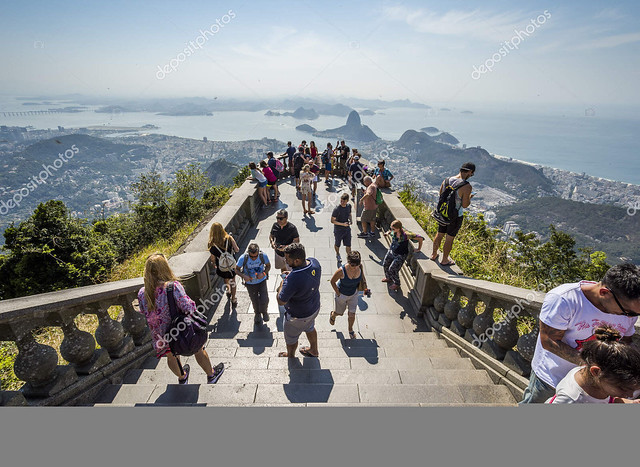 Tourists enjoying Cristo Redentor monument on top of Morro do Corcovado in Floresta da Tijuca, Rio de Janeiro, Brazil