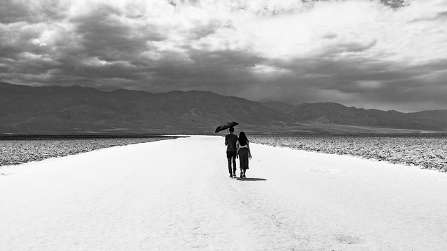 Couple walking through Death Valley