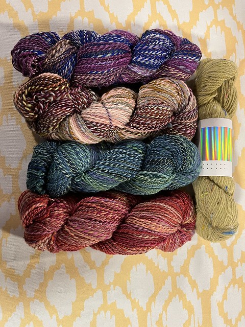 Paulette (@psknitting50) is going to use these 4 hand spun yarns with the Hedgehog Tweedy as her main colour to knit herself another Ninilchik Swoncho by Caitlin Hunter. She is working on her fifth CC.