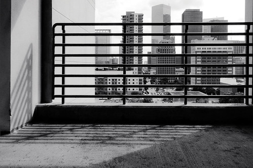 janbuchholtz monochrome houston downtown architecture jail jailhouse shadows patterns jailed incarcerated prohibited buildings skyscraper blocked railing imprisoned detained confined