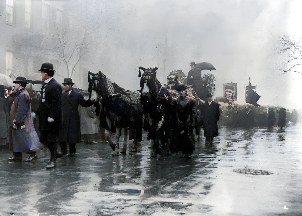 People and horses draped in black walk in procession in memory of the victims of the Triangle Shirtwaist Company fire, New York City