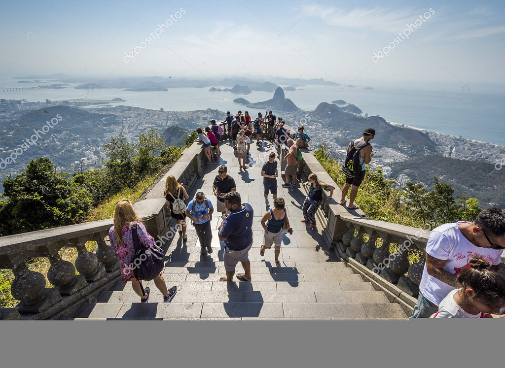 Tourists enjoying Cristo Redentor monument on top of Morro do Corcovado in Floresta da Tijuca, Rio de Janeiro, Brazil