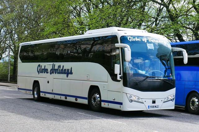 Diamond Traveller of Barnsley (Globe Holidays) Volvo B11R Plaxton Panther 3 YX19MLZ at Regent Road, Edinburgh, on 11 May 2023.