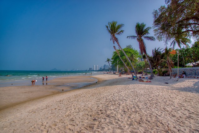 Beach with palm tress in Hua Hin, Thailand