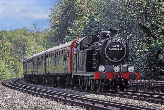 On 16th May 1992 the driver leans out of the cab of Ex-GER Hill N7 0-6-2T no. 69621 as it approaches Lodge Lane, Chalfont with a northbound passenger train during a Steam on The Met weekend