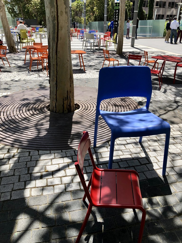 Chairs in Salesforce Park. Different sizes, different colors