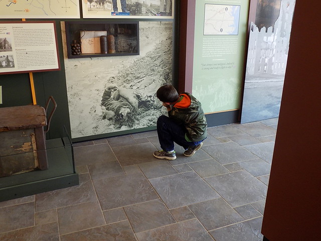 A young visitor learns about the horrors of war at Sailor's Creek Museum