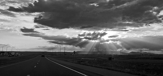 Interstate 40 - approaching Albuquerque from the east.  Sandia Mountains on the right, on horizon.  New Mexico, USA.