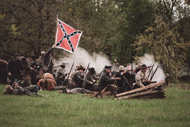Confederate Civil War reenactors in battle